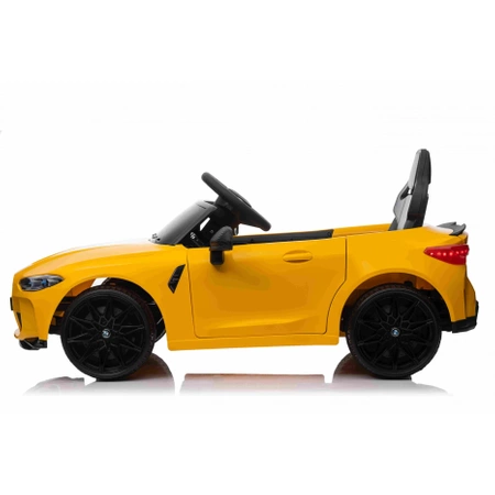 Pojazd na akumulator BMW M4 żółty dla dzieci